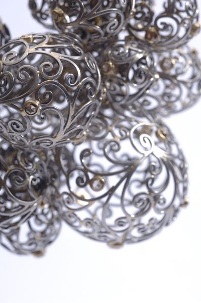 Lola Brooks, 32balls, 2005, pendants, stainless steel, champagne rose-cut diamonds, 18-karat gold, 7.5 x 3.5 x 20 inches, Private Collection, photo: Kevin Sprague