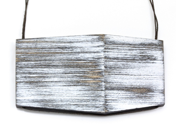 Julia Turner, White Slide Pendant, 2014, wood, sterling silver, string, paint, 48 x 85 x 6 mm, photo: Kate Eickelberg