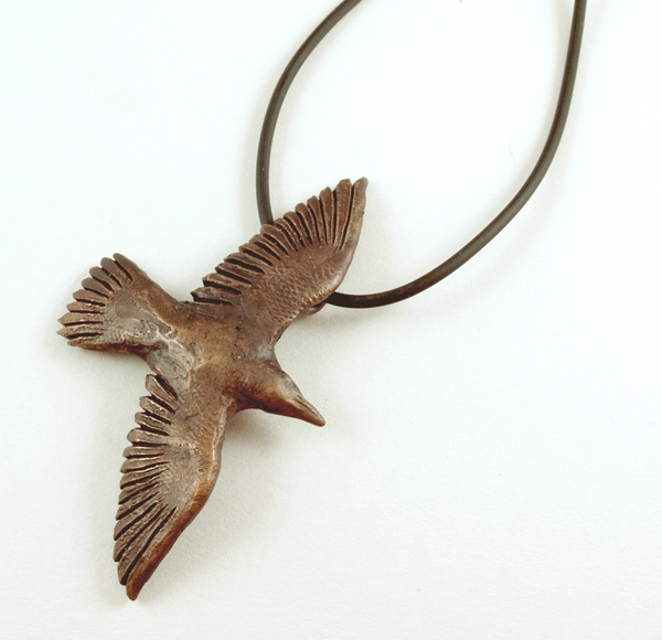 Lisa West, Seabird, 2014, pendant, bronze, rubber cord, sterling silver, 80 x 48 x 12 mm, photo: Spring Rees