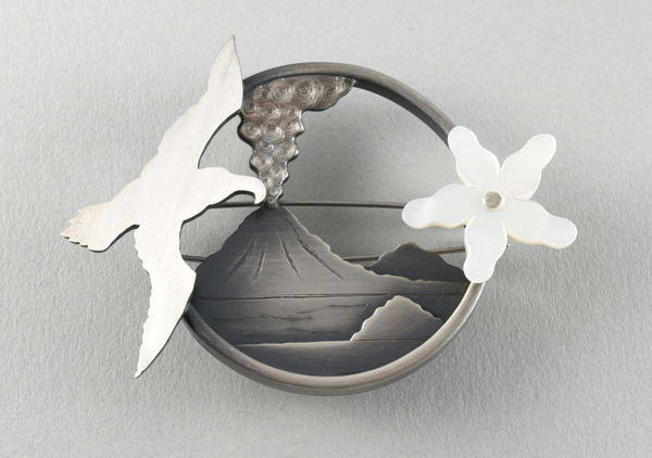 Lisa West, Volcano porthole, 2014, brooch, sterling silver, mother-of-pearl, 66 x 48 x 13 mm, photo: Spring Rees