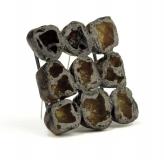 Xiao Liu, the Rice Stone, 2013, brooch, grain, dust, silver, 50 x 70 x 28 mm, photo: artist Xiao Liu